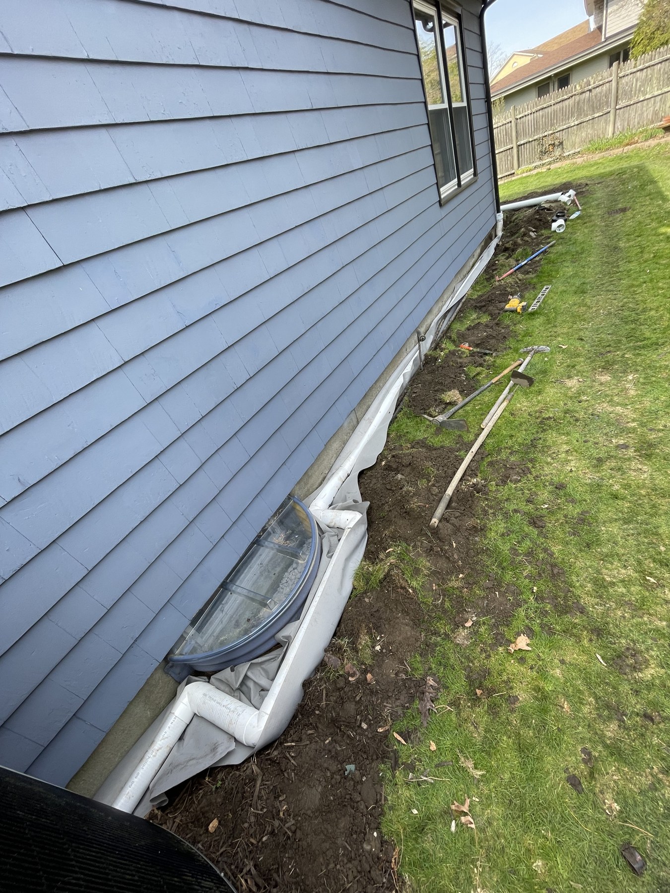 Drainage work along a foundation by Blue Line